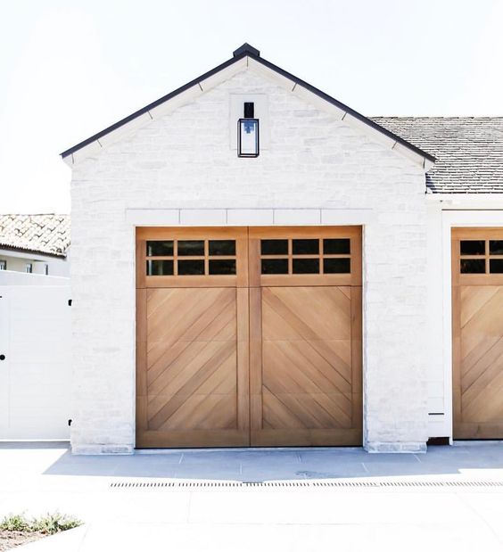 White brick with wood garage door